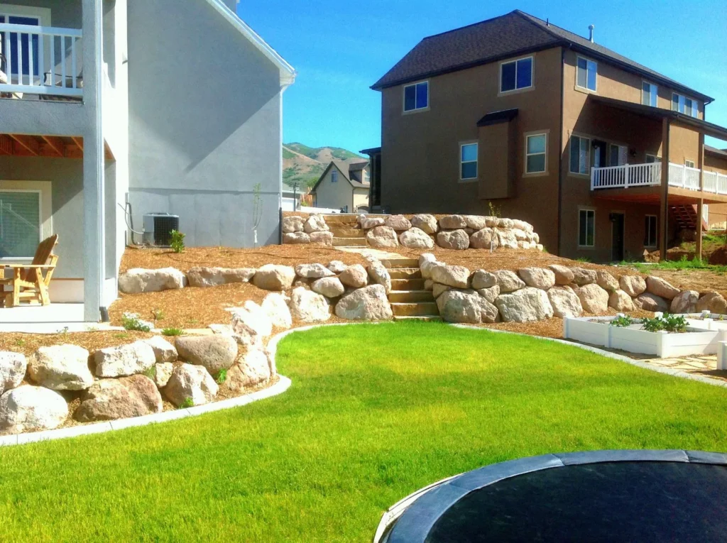 Boulder Walls vs. Concrete Blocks: Which is Best for Utah County Terrain? Boulder Walls vs. Concrete Blocks: Which is Best for Utah County Terrain?
