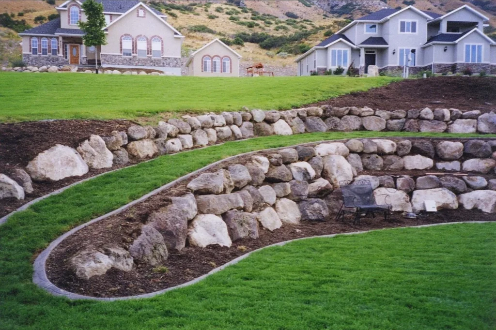 Boulder Walls vs. Concrete Blocks: Which is Best for Utah County Terrain? Boulder Walls vs. Concrete Blocks: Which is Best for Utah County Terrain?